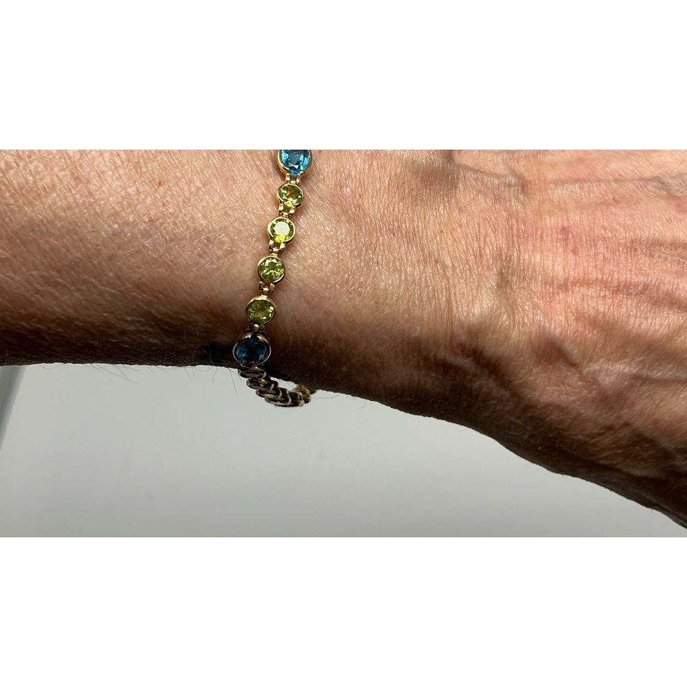 14K yellow gold blue topaz & peridot and bracelet